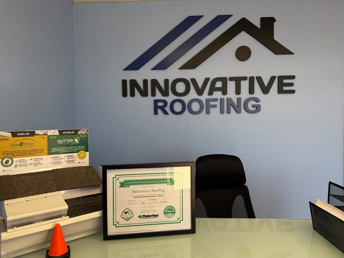 Innovative Roofing office with Malarkey certification display