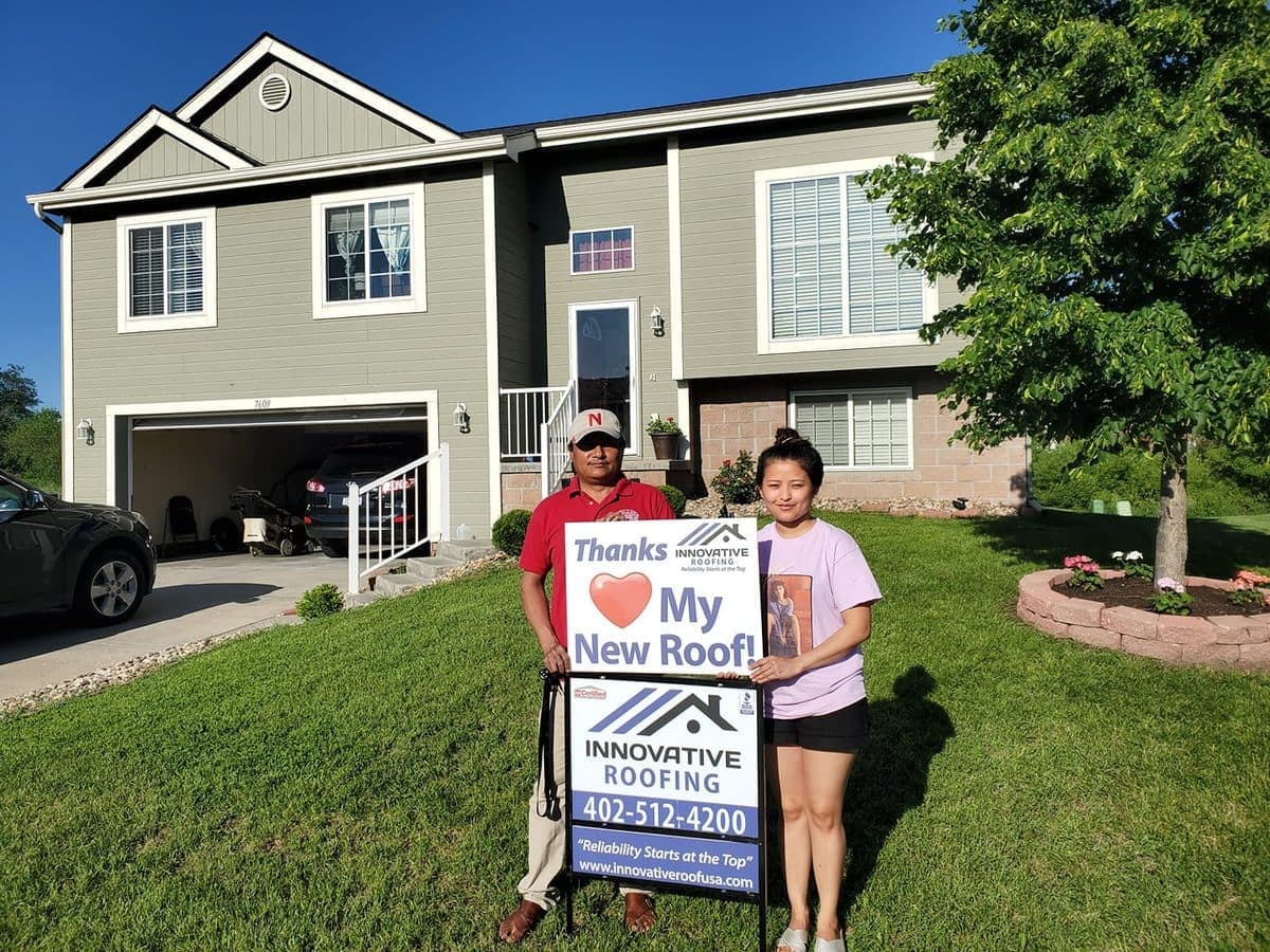 Customer thank-you sign after Innovative Roofing service