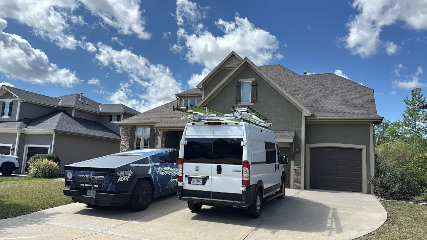 Innovative Roofing vehicles at the completed Douglas County roof replacement